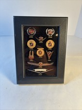 VTG Licensed GM Framed Collection Of 10 Cadillac Enamel Emblem Lapel Pins 100yrs picture