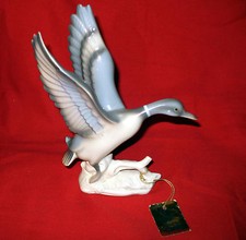 ATTRACTIVE ENESCO DUCK PORCELAIN FIGURINE picture