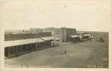 1909 Bellevue Texas Franklin Street Wagon Yard Clay RPPC Postcard 25-6492 picture