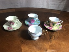 (4) VTG MINIATURE FLORAL CUPS & SAUCERS~3 HAVE ATTACHED SAUCERS & 1 IS CUP ONLY picture