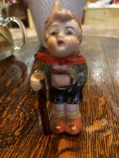 Hand Painted porcelain figurine of a German-style hiker boy w/ walking stick. picture