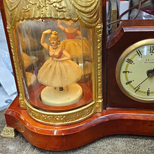 United Model 870 Animated Lighted Musical Mantel Clock Analog Arabic Wood picture