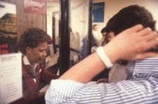 1988 35mm Slide NYC Penn Station Ticket Counter Man Woman picture