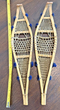 Pair of Mini Native Ojibwa Snowshoes - Rawhide Weaving with Decorative Pompoms picture