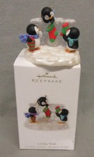 2010 Hallmark Keepsake Ornament A FISHY WISH 3 Penguins Hanging Stockings NIB picture