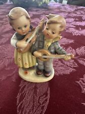 Hummel Figurine Boy And Girl Playing Guitars Made In Germany. picture