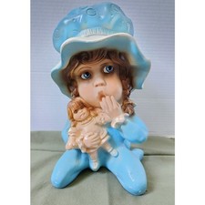 Rare Universal Statuary Girl in Blue Pajamas holding Doll 1974 MCM picture