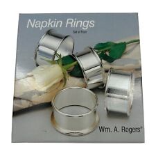4 Vintage Wm A Rogers Oneida Silver Plated Napkin Rings picture