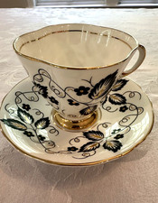 Vintage Clarence Bone China Teacup and Saucer England Black, White, and gold picture