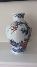 vintage Japanese Arita porcelain vase, About 9.5 in tall 6.5 in at widest point picture