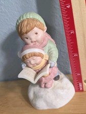 Avon Christmas Carolers Figurine Joy To The World Musical Figurine 1985 Video picture