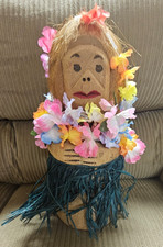 Hawaiian coconut monkey figurine with grass skirt and lei picture