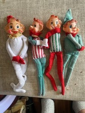 1950s–1960s Japanese rubber-face knee-hugger pixie elves picture
