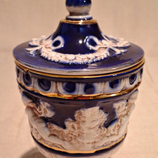 Blue White Gold Ceramic Cherub Relief Lidded Jar, Italy, 1900-1919. 9.25