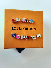LV  multicolored metal   silver  zipper pull  letters  buttons picture