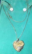 Gorham Footprints in the sand Sterling Silver lart necklace and pendant. picture