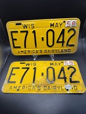 Vintage 1958 Wisconsin License Plates Pair E71-042 Yellow Tabbed Dairyland picture