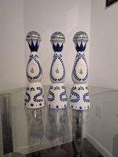 empty liquid bottles with its cases (Louis X111, The John Walker, Claze Azul) picture