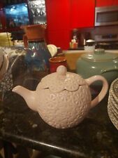 pink ceramic teapot picture