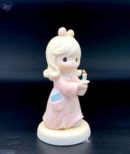 Adorable Precious Moments Girl Figurine Holding a Candle picture