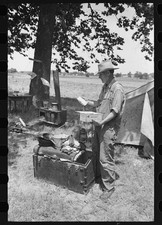 Wagoner County Oklahoma 1939 Migrant Worker Camp Trunk Examining Contents picture