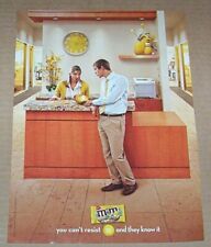 2011 advertising page -M&M's candies CUTE YELLOW hiding on shelf office PRINT AD picture