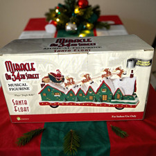 Miracle On 34th Street Santa Sled Float Musical Figurine CHRISTMAS see video picture