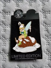 Rare Tinkerbell in the snow, sitting on a pine cone pin. Disney LE 250 picture