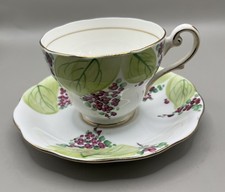 Hand-Painted Unbranded Bone China Teacup and Saucer Set Made in England picture