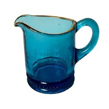 KAUKAUNA WI WISCONSIN  Souvenir ANTIQUE DEPRESSION BLUE Glass TRINKET CREAMER picture