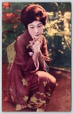 1920's JAPAN GEISHA GIRL BURGUNDY KIMONO ANTIQUE POSTCARD JAPANESE CHARACTERS picture