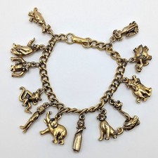 Vintage Walt Disney Productions Jungle Book Gold Tone 12-Charm Bracelet 7in picture
