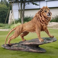 Majestic Lion Statue - Lion King Standing On The Cliff picture