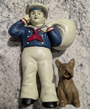 VINTAGE HEAVY CAST IRON CRACKER JACK SALUTING SAILOR & DOG DOOR STOP CANDLE HLDR picture