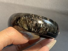 58.3mm Wide Natural Shinning Black Astrophyllite Bangle picture