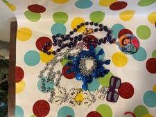 2022 Krewe of Iris Sunglasses and Rolling Medallion Beads Mardi Gras horse picture