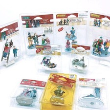 LOT OF 9 PACKS OF ASSORTED LEMAX VILLAGE CAROLE TOWNE FIGURINES NEW picture