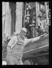 Photo:Oilfield Worker Drilling Rig 1935-1945 Overalls Machinery Roadside picture