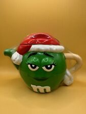 M&M's Christmas Miss Green Ceramic Tea Pot Teapot w/ Red Santa Hat Galerie picture