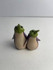 ENESCO HOME GROWN FIGURINE - EGGPLANT PENQUINS picture