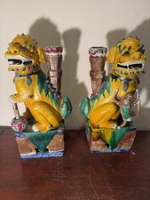 PAIR OF YELLOW GLAZED FU DOGS picture