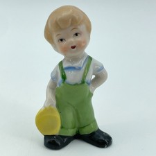 JAPAN Vintage Boy Porcelain Figurine Green Overalls Yellow Hat Decor 3.5in picture