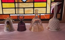 four decorative porcelain and glass bells or bell-shaped collectibles picture
