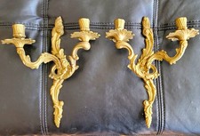 A pair of Louis XV-style or Rococo-inspired wall-mounted candle sconces picture