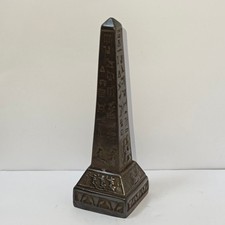 Egyptian Obelisk Replica – Black Hieroglyphic Sculpture in Ancient Eastern Style picture