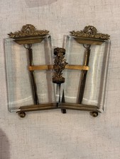victorian double paneled, photo frame with thick beveled glass and a vase for a  picture