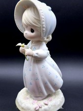 Precious Moments Adorable Porcelain Figurine of a Girl with Flower picture