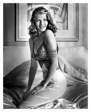RITA HAYWORTH SEXY ACTRESS SITTING ON BED 8X10 PUBLICITY PHOTO picture