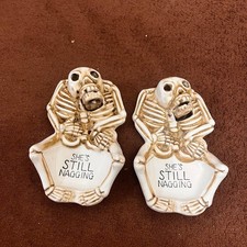 Pair Vintage Skeleton Moving Jaw Ashtray She's Still Nagging picture