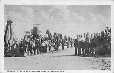 1913 NEW YORK PHOTO POSTCARD: MEN ON COMPANY STREET AT SYRACUSE CAMP, NY picture